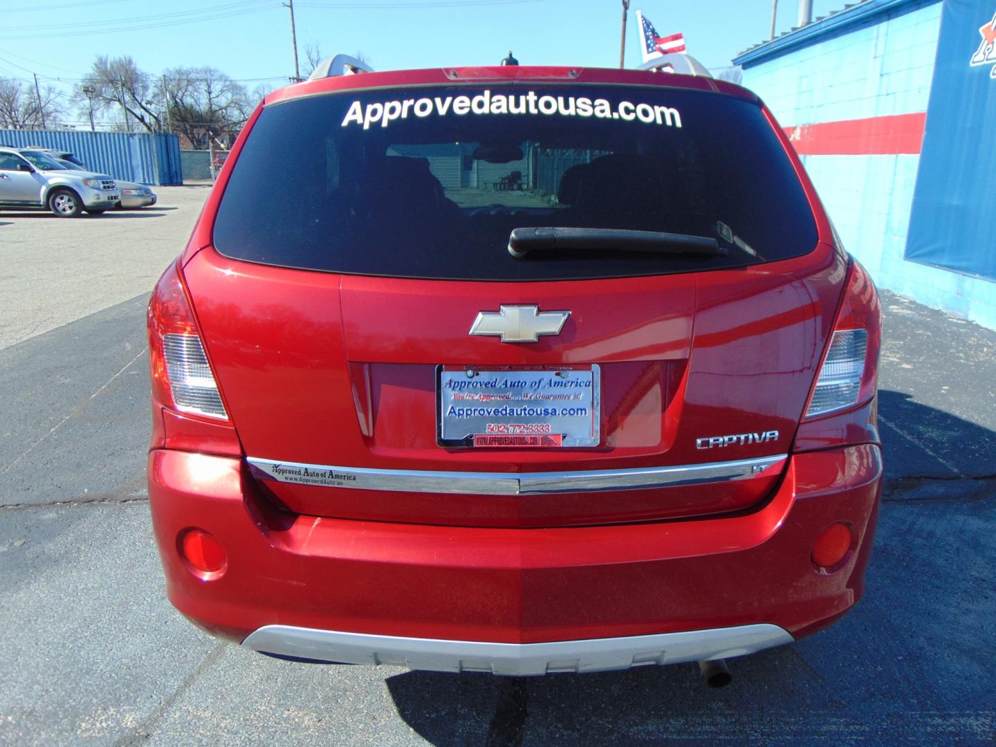 2015 Red Chevrolet Captiva Sport (3GNAL3EK6FS) with an 4-Cyl Flex Fuel 2.4 Liter engine, Automatic, 6-Spd transmission, located at 2105 Dixie Hwy, Louisville, KY, 40210, (502) 772-3333, 38.220932, -85.795441 - Photo#10